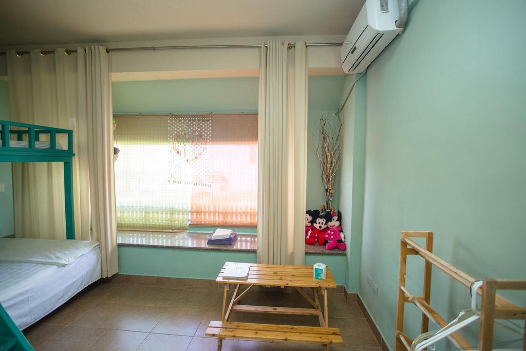G.T. Guest House Garapan Habitación foto