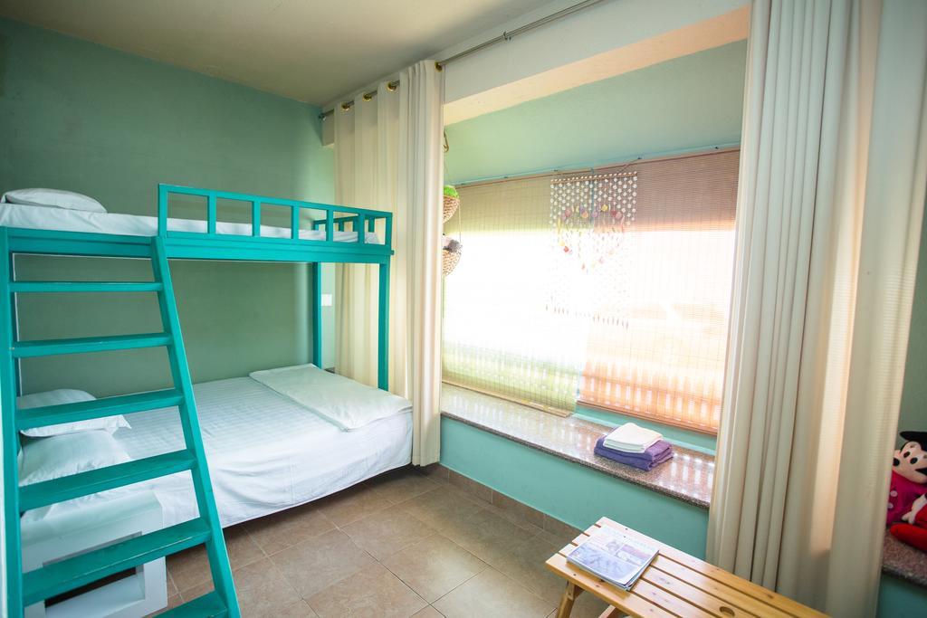 G.T. Guest House Garapan Habitación foto