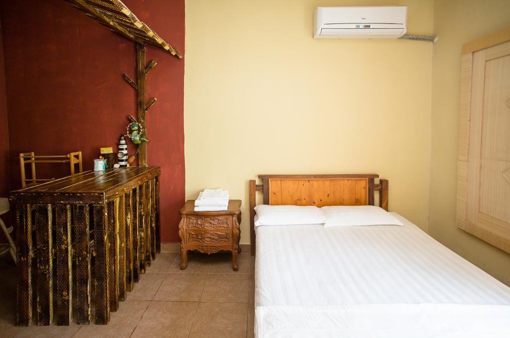 G.T. Guest House Garapan Habitación foto
