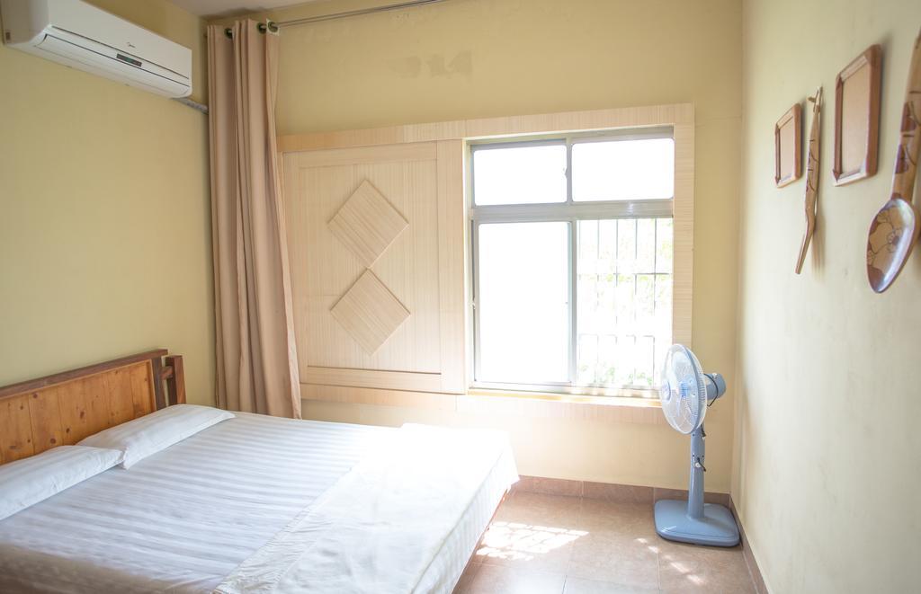 G.T. Guest House Garapan Habitación foto